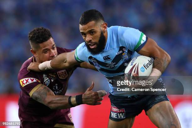 Josh Addo-Carr of the Blues is tackled during game two of the State of Origin series between the New South Wales Blues and the Queensland Maroons at...