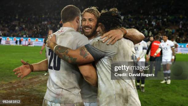Mark Wilson Chris Robshaw and Harry Williams celebrate their victory during the third test match between South Africa and England at Newlands Stadium...