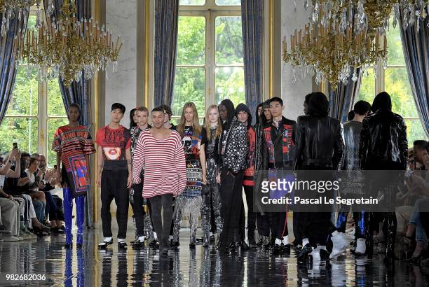 Designer Olivier Rousteing walks the runway with models during the Balmain Menswear Spring/Summer 2019 show as part of Paris Fashion Week on June 24,...