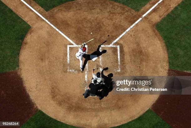 Mark Reynolds of the Arizona Diamondbacks hits a two-run home run against the San Diego Padres during the third inning of the Opening Day major...