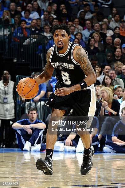 Roger Mason Jr. #8 of the San Antonio Spurs moves the ball up court during the game against the Oklahoma City Thunder at Ford Center on March 22,...