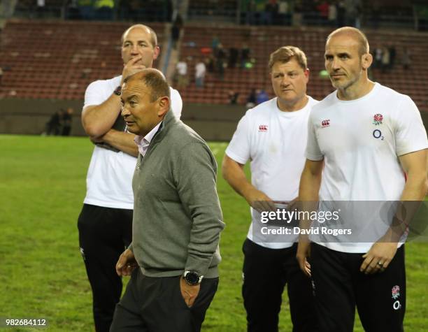 England head coach, Eddie Jones, walks off the field with his team of coaches, Steve Borthwick , Neal Hatley and Paul Gustard after their victory...