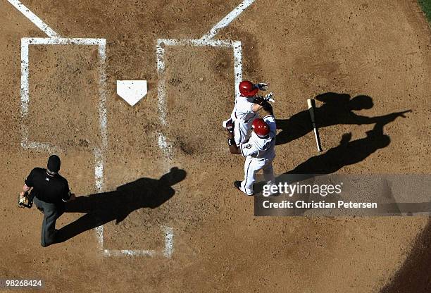 Stephen Drew of the Arizona Diamondbacks is congratulated by teammate Justin Upton after hitting a 2 run inside the park home run against the San...