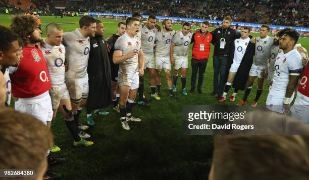 England captain Owen Farrell talks to his team after their victory during the third test match between South Africa and England at Newlands Stadium...