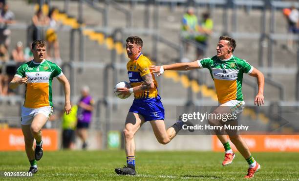 Offaly , Ireland - 24 June 2018; Ciarán Malone of Clare in action against Michael Brazil of Offaly during the GAA Football All-Ireland Senior...