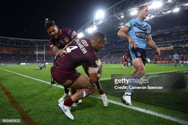 Will Chambers of Queensland scores a try during game two of the State of Origin series between the New South Wales Blues and the Queensland Maroons...
