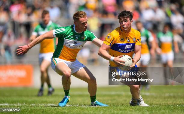 Offaly , Ireland - 24 June 2018; Keelan Sexton of Clare in action against Declan Hogan of Offaly during the GAA Football All-Ireland Senior...