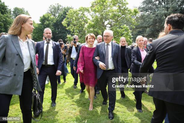 German President Frank-Walter Steinmeier and First Lady Elke Buendenbender smile during their walk at the open-house day at the Villa Hammerschmidt...