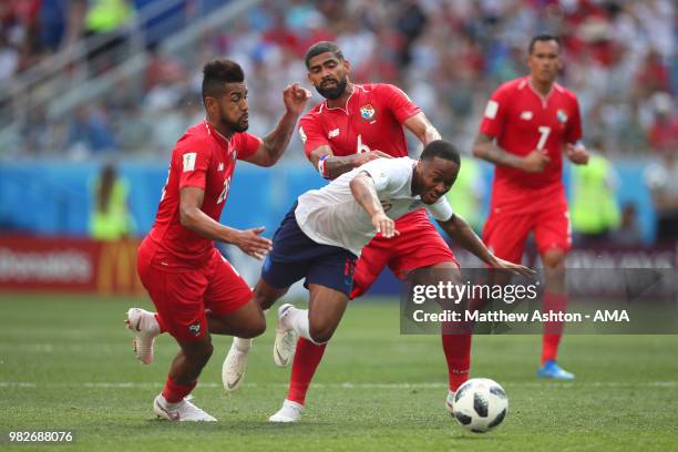 Raheem Sterling of England is challenged by Gabriel Gomez and Anibal Godoy of Panama during the 2018 FIFA World Cup Russia group G match between...