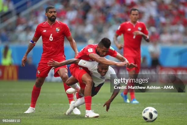 Raheem Sterling of England is challenged by Gabriel Gomez and Anibal Godoy of Panama during the 2018 FIFA World Cup Russia group G match between...