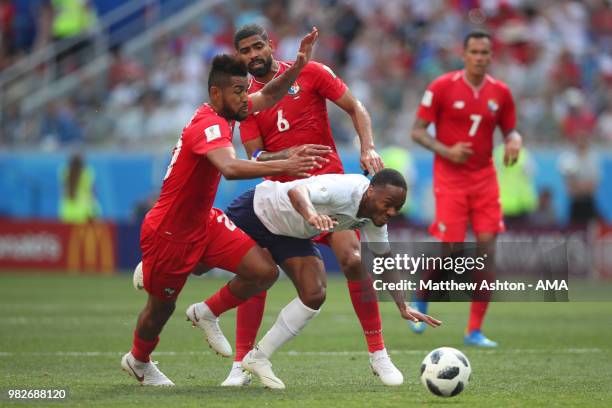 Raheem Sterling of England is challenged by Gabriel Gomez and Anibal Godoy of Panama during the 2018 FIFA World Cup Russia group G match between...