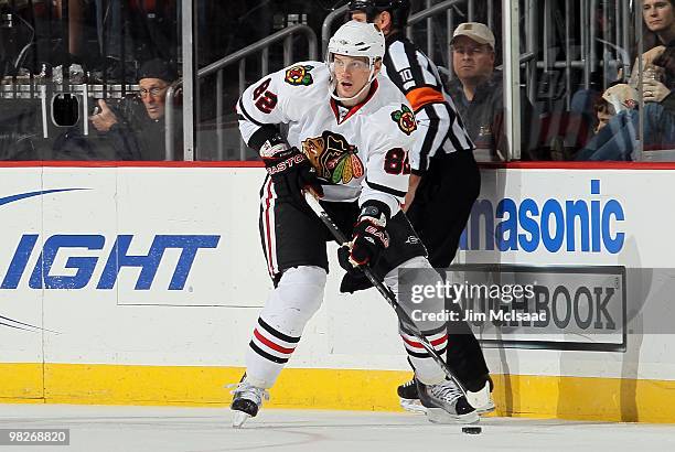 Tomas Kopecky of the Chicago Blackhawks skates against the New Jersey Devils at the Prudential Center on April 2, 2010 in Newark, New Jersey. The...