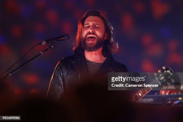 Chris Cester and his band JET perform during game two of the State of Origin series between the New South Wales Blues and the Queensland Maroons at...