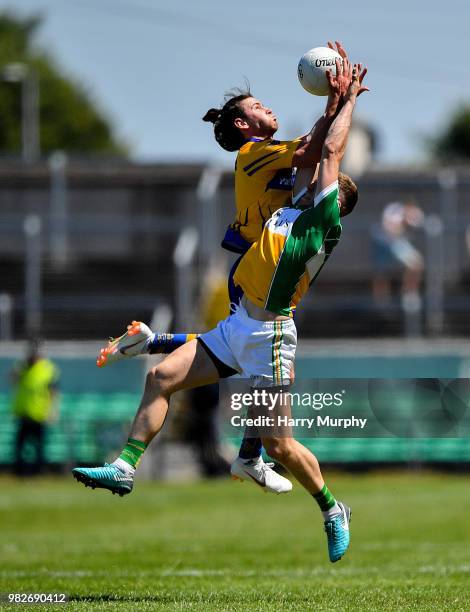 Offaly , Ireland - 24 June 2018; Cian O'Dea of Clare in action against Cian Donohue of Offaly during the GAA Football All-Ireland Senior Championship...