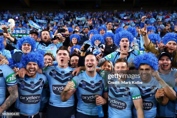 The Blues celebrate with the crowd after victory in game two of the State of Origin series between the New South Wales Blues and the Queensland...