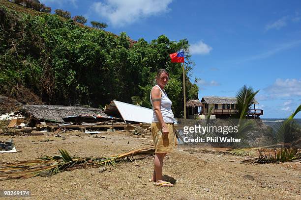 Owner Wendy Booth looks on at the devastation of her destroyed Seabreeze resort following the 8.3 magnitude strong earthquake which struck 200km from...