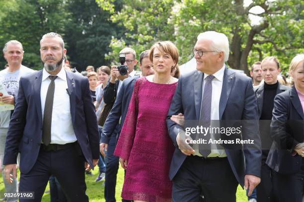 German President Frank-Walter Steinmeier and First Lady Elke Buendenbender smile during their walk at the open-house day at the Villa Hammerschmidt...