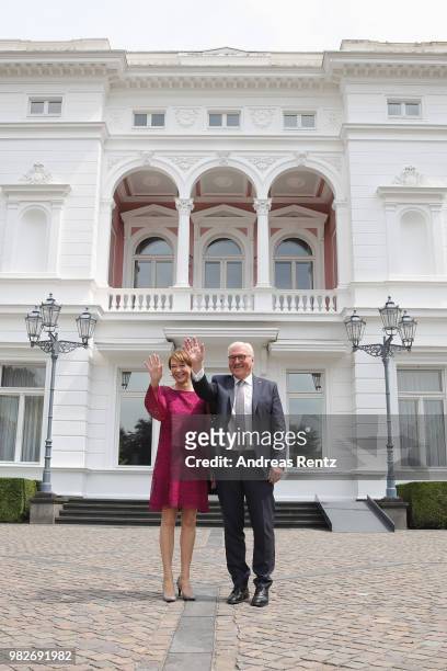 German President Frank-Walter Steinmeier and First Lady Elke Buendenbender wave as they for the open-house day at the Villa Hammerschmidt on June 24,...