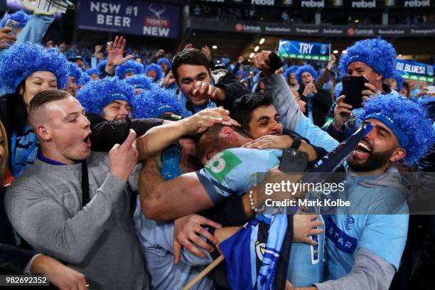 Boyd Cordner of the Blues celebrates with the crowd after victory in game two of the State of Origin series between the New South Wales Blues and the...
