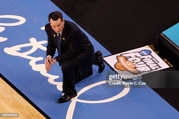 Head coach Mike Krzyzewski of the Duke Blue Devils looks on in the first half while taking on the Butler Bulldogs during the 2010 NCAA Division I...