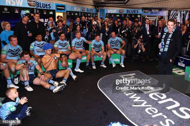 Blues coach Brad Fittler speaks to his team as they celebrate victory after game two of the State of Origin series between the New South Wales Blues...