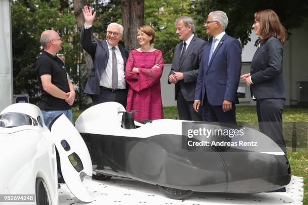 German President Frank-Walter Steinmeier and First Lady Elke Buendenbender gets informed at the research group 'Efficient Mobility' booth of the...