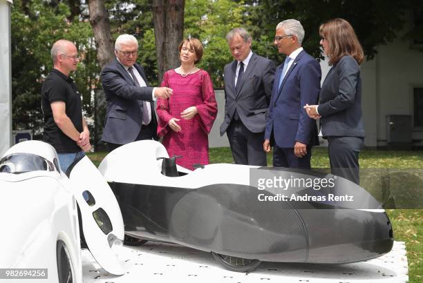 German President Frank-Walter Steinmeier and First Lady Elke Buendenbender gets informed at the research group 'Efficient Mobility' booth of the...