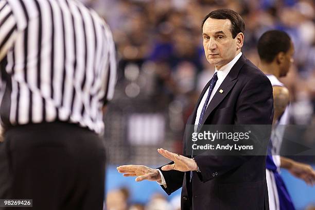 Head coach Mike Krzyzewski of the Duke Blue Devils yells at a refere in the first half while taking on the Butler Bulldogs during the 2010 NCAA...