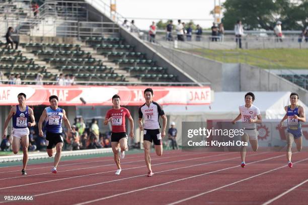 Wataru Inuzuka, Yuki Koike, Yoshihide Kiryu, Shota Iizuka, Yoshihiro Someya and Masafumi Naoki compete in the Men's 200m final on day three of the...