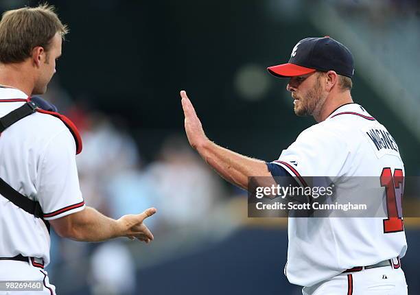 Billy Wagner and David Ross of the Atlanta Braves celebrate after the game against the Chicago Cubs during Opening Day at Turner Field on April 5,...