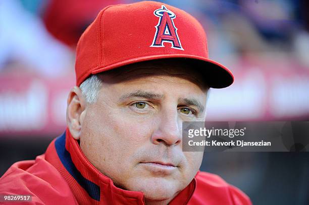 The Los Angeles Angels of Anaheim manager Mike Scioscia stands on the field prior to the game against the Minnesota Twins on Opening Day at Angel...