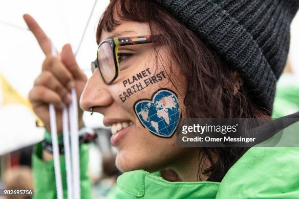 Demonstrators gather in front of the Chancellery during a "Stop Coal" protest on June 24, 2018 in Berlin, Germany. While Germany has set ambitious...