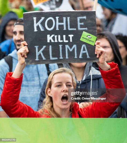 Demonstrators gather in front of the Chancellery during a "Stop Coal" protest on June 24, 2018 in Berlin, Germany. While Germany has set ambitious...