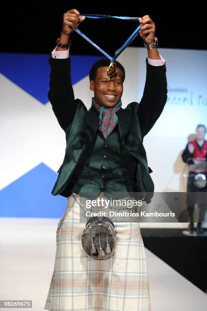 Olympian Shani Davis attends the 8th annual "Dressed To Kilt" Charity Fashion Show at M2 Ultra Lounge on April 5, 2010 in New York City.