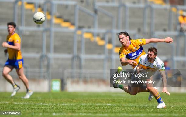 Offaly , Ireland - 24 June 2018; Brian Darby of Offaly in action against Cian O'Dea of Clare during the GAA Football All-Ireland Senior Championship...