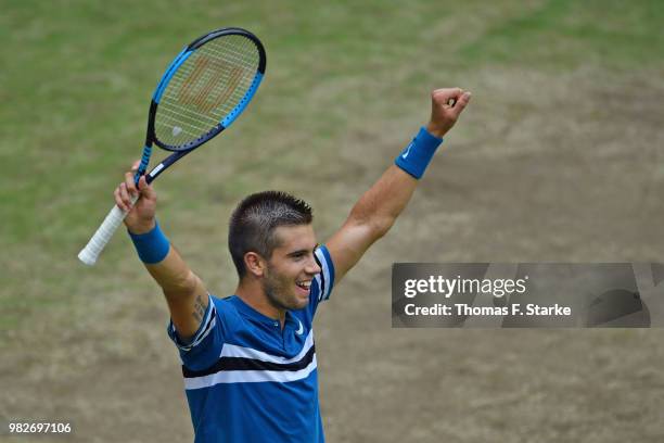 Borna Coric of Croatia celebrates after winning the final match against Roger Federer of Switzerland during day seven of the Gerry Weber Open at...