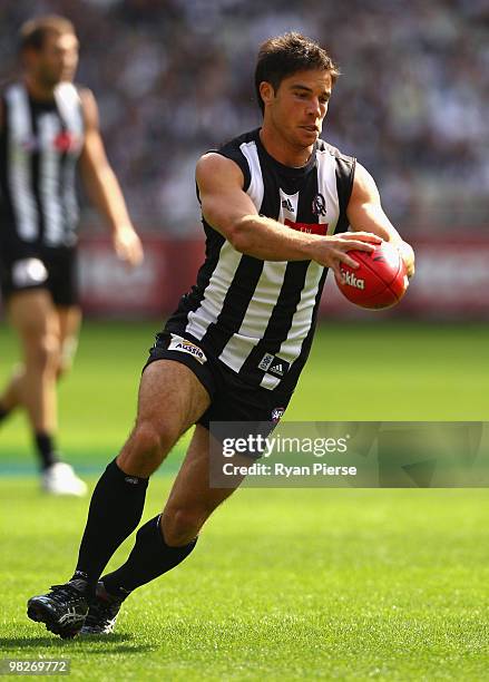 Paul Medhurst of the Magpies prepares to kick during the round two AFL match between the Collingwood Magpies and the Melbourne Demons at the...