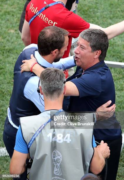 Gareth Southgate, Manager of England speaks with Hernan Gomez, Manager of Panama following Panama's defeat in the 2018 FIFA World Cup Russia group G...