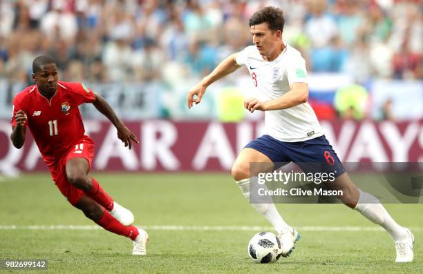 Harry Maguire of England runs with the ball at Armando Cooper of Panama during the 2018 FIFA World Cup Russia group G match between England and...