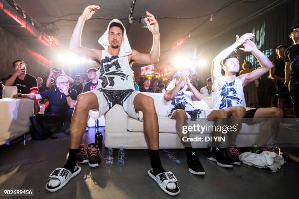 Player Klay Thompson of the Golden State Warriors watch a live play on June 24, 2018 in Beijing, China.