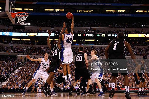 Lance Thomas of the Duke Blue Devils attempts a shot in the second half against Avery Jukes of the Butler Bulldogs during the 2010 NCAA Division I...