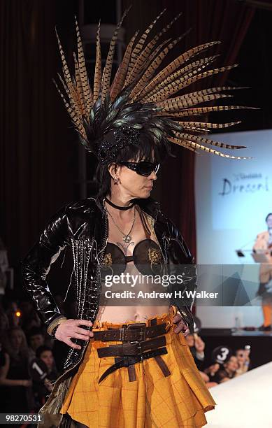 Musician Joan Jett walks the runway at the 8th annual "Dressed To Kilt" Charity Fashion Show presented by Glenfiddich at M2 Ultra Lounge on April 5,...