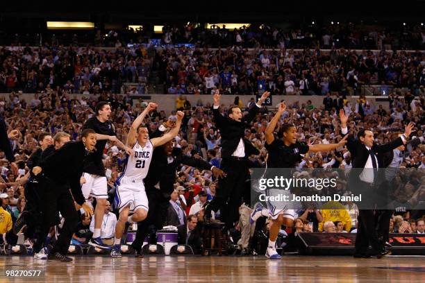 Head coach Mike Krzyzewski of the Duke Blue Devils and his players celebrate after they won 61-59 against the Butler Bulldogs during the 2010 NCAA...