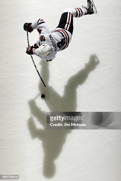 Niklas Hjalmarsson of the Chicago Blackhawks warms up before playing against the New Jersey Devils at the Prudential Center on April 2, 2010 in...