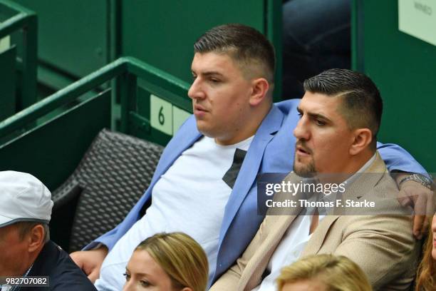 Boxer Marco Huck with his brother Kenan Hukic during day seven of the Gerry Weber Open at Gerry Weber Stadium on June 24, 2018 in Halle, Germany.