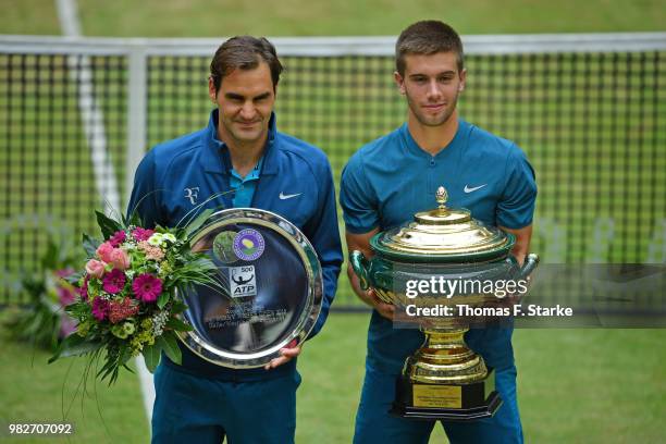 Roger Federer of Switzerland and Borna Coric of Croatia during day seven of the Gerry Weber Open at Gerry Weber Stadium on June 24, 2018 in Halle,...