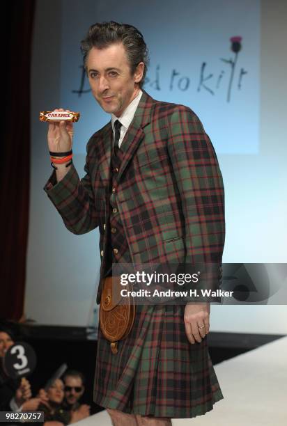 Actor Alan Cumming walks the runway at the 8th annual "Dressed To Kilt" Charity Fashion Show presented by Glenfiddich at M2 Ultra Lounge on April 5,...