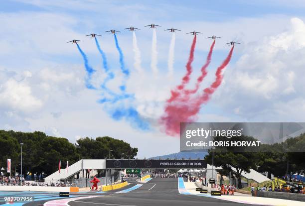 The Patrouille de France performs ahead of the Formula One Grand Prix de France at the Circuit Paul Ricard in Le Castellet, southern France, on June...