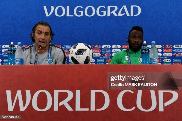 Saudi Arabia's Argentine-born Spanish coach Juan Antonio Pizzi and Saudi Arabia's forward Fahad Al-Muwallad attend a press conference at the...