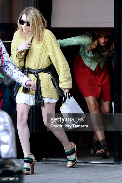 Actress Ashley Olsen and Helena Christensen leave the Serge Normant at John Frieda Salon on April 05, 2010 in New York City.